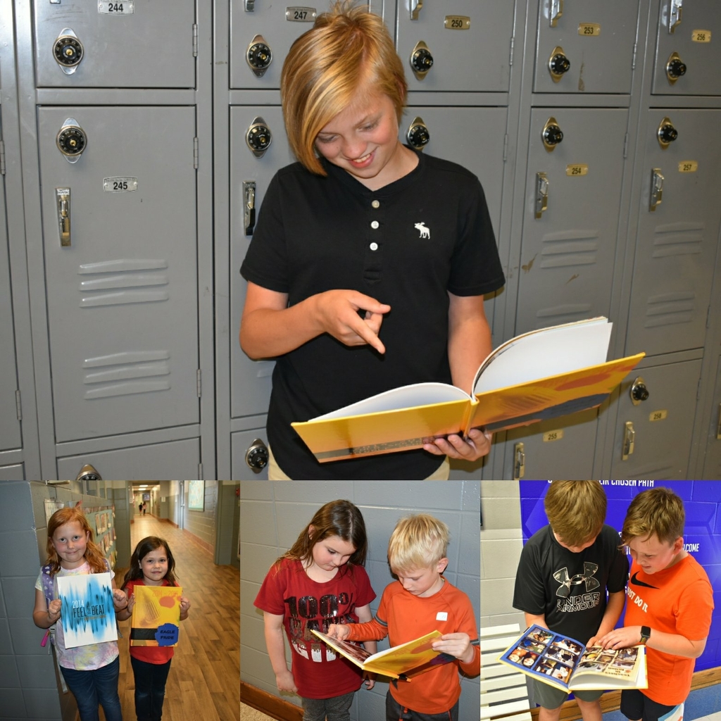 kindergarten thru 8th grade students looking at school yearbooks.