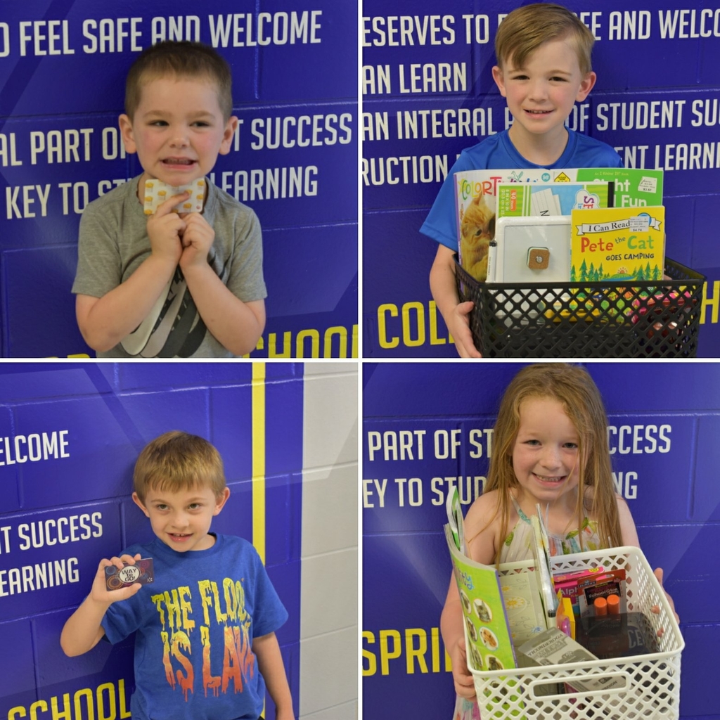 4 preschool students holding prizes they won for registering for kindergarten.