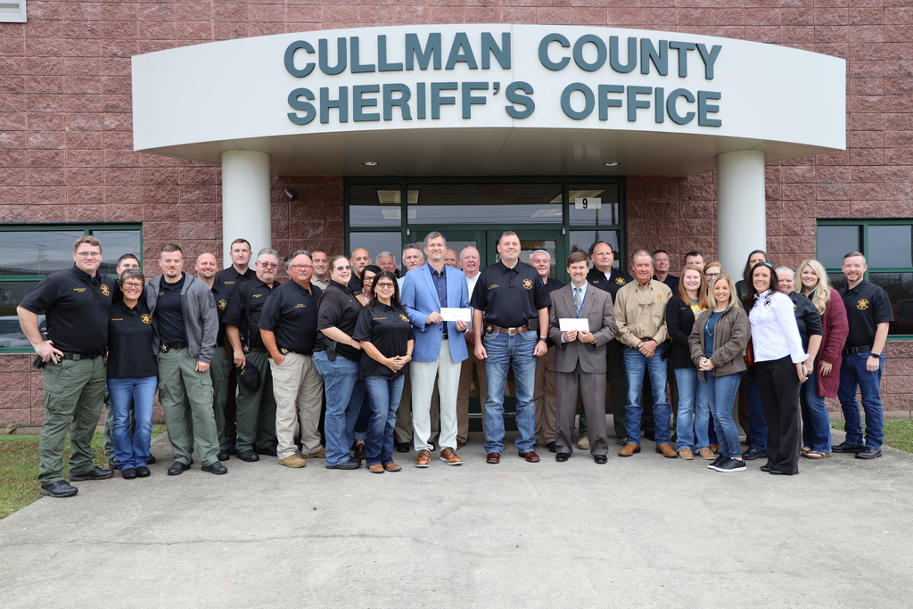 Dr. Barnette receives check from Cullman County Sheriff's Office
