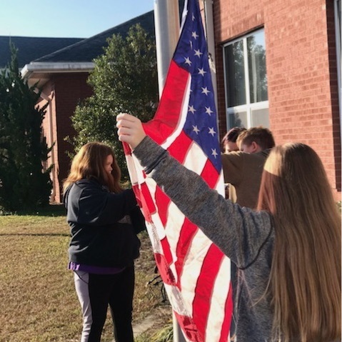 Lowering the flag
